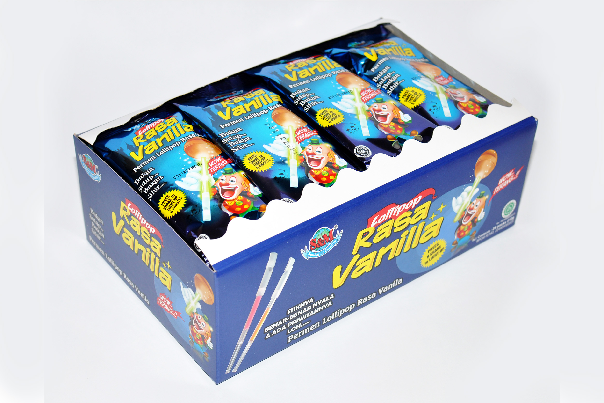 A Glowing, Eye-Catching Treat to Brighten Any Moment!  Deposit lollipops with vivid colours that come in two variants—S&M Vanilla Lollipop (Glowing Stick) and Magic Glow Lollipop (Glowing & Whistle Stick). Candy infused with a rich milk flavour profile and a lovely hint of vanilla to suit all palates. Irresistibly tempting, it is an eye-catching addition to your jar of sweets and is a perfect companion for fun-filled occasions such as birthday parties, gatherings, concerts, special traditions (Valentines, Halloween), festive seasons (Christmas and New Year), and many more.   It is made by special moulds through the deposit process to create a uniformed sized and shaped candy with a smooth surface finish that fits perfectly in the mouth. The soft fluorescence glow emitted by this playful, crowd-pleaser treat will brighten up your special moments and bring out a lot of fun! Ever since its breakthrough in the Indonesian market, it has been an instant hit with the kids and teens—and many fun-loving adults too!  The glowing stick is made from high quality, non-toxic material, making it completely safe for children. Because of its sturdiness, it is bendable without breaking, thus preventing the chemical substance from leaking out.  Magic Glow/S&M Vanilla Lollipop is manufactured by PT. Internusa Food, a modern and innovative confectionery and candy manufacturer in Indonesia with longstanding tradition of excellence. Competitively-priced to cater the middle-low market segments, PT. Internusa Food has produced well-known brands loved by the Indonesian customers and overseas markets over the years. The Company’s products have been exported to many countries in Southeast Asia, Asia Pacific, U.S.A, the Middle East and Africa. Its high-quality products follows the ISO 22000:2005 Food Safety Management System and the Indonesian Food and Drug Monitoring Agency (BPOM). All products are also Halal-certified by Indonesian Ulama Council (MUI). Magic Glow/S&M Vanilla Lollipop is available for bulk purchasing with B2B wholesale price.   Package content:  - S&M Vanilla Lollipop (Glowing Stick): 20bags @20pcs @8g  - Magic Glow Lollipop (Glowing & Whistle Stick): 12boxes @24pcs @12g